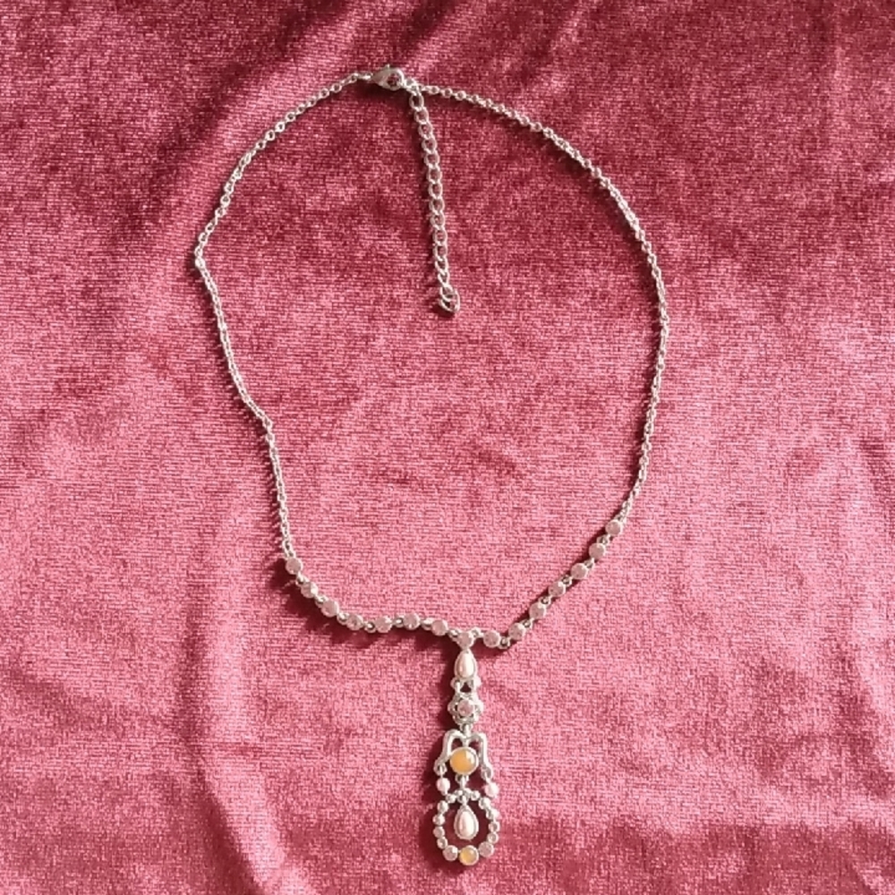 Elegant Silver Necklace with Gold Accents